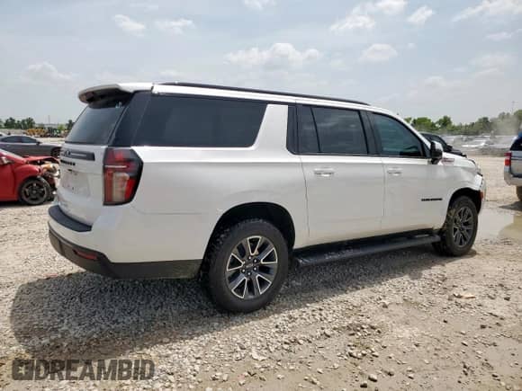 2023 Chevrolet Suburban Z71 с VIN 1GNSKDKD5PR442859, выставлен на аукционе Copart как лот 62686035 с пробегом 42 313 миль миль и Списание • Salvage title. История ставок и продаж доступна на DreamBid. Изображение 3.