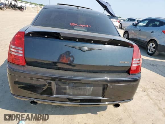 2007 Chrysler 300 C SRT-8 with VIN 2C3LA73W27H821999, listed as a Copart auction lot 66556735 with Not provided miles and Salvage title. Bid and sale history available at DreamBid. Image 6.