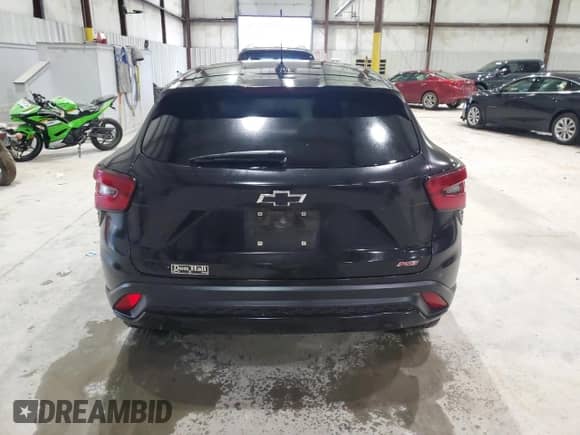 2024 Chevrolet Trax 1RS с VIN KL77LGE23RC018932, выставлен на аукционе Copart как лот 85346065 с пробегом Не указан миль и Списание • Salvage title. История ставок и продаж доступна на DreamBid. Изображение 6.