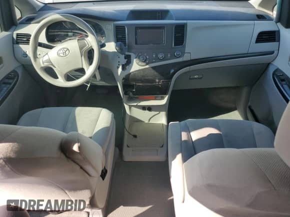 2012 Toyota Sienna with VIN 5TDZK3DC2CS184186, listed as a Copart auction lot 71013535 with 172,772 mi miles and Salvage title. Bid and sale history available at DreamBid. Image 8.