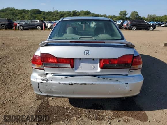 2002 Honda Accord EX with VIN 1HGCG56692A038763, listed as a Copart auction lot 71771595 with 158,801 mi miles and Salvage title. Bid and sale history available at DreamBid. Image 6.