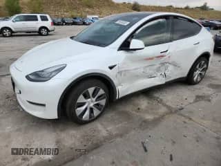 2022 Tesla Model Y Long Range с VIN 7SAYGDEE7NF313908, выставлен на аукционе Copart как лот 71536385 с пробегом Не указан миль и Списание • Salvage title. История ставок и продаж доступна на DreamBid. Изображение 1.