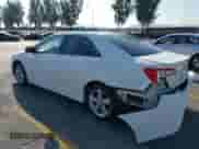 2014 Toyota Camry SE with VIN 4T1BF1FK3EU809509, listed as a IAAI auction lot 43321909 with 212,454 mi miles and . Bid and sale history available at DreamBid. Image 3.