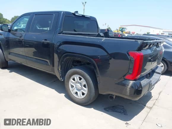 2022 Toyota Tundra SR with VIN 5TFKB5AB7NX017988, listed as a IAAI auction lot 42986871 with 50,437 mi miles and . Bid and sale history available at DreamBid. Image 3.