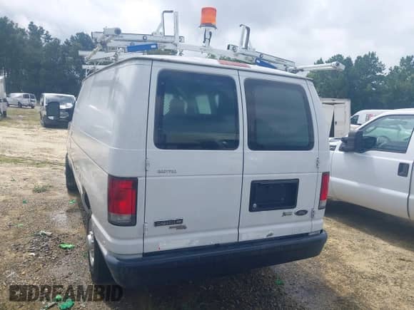 2013 Ford Econoline Cargo Commercial with VIN 1FTNE1EW7DDB01352, listed as a IAAI auction lot 42908765 with 102,950 mi miles and . Bid and sale history available at DreamBid. Image 16.