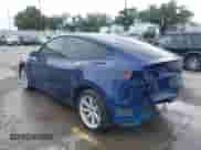 2022 Tesla Model Y Long Range z VIN 7SAYGAEE1NF399523, wystawiony jako IAAI lot #43175077 z przebiegiem 115 467 mil mil oraz . Historia ofert i sprzedaży dostępna na DreamBid. Obrazek 3.