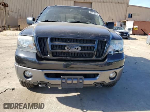 2007 Ford F-150 XLT with VIN 1FTPX04507KD03875, listed as a Copart auction lot 82097194 with 144,057 mi miles and Salvage title. Bid and sale history available at DreamBid. Image 5.