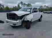 2018 Ram 1500 SLT with VIN 1C6RR6GG7JS303941, listed as a IAAI auction lot 41942236 with 142,098 mi miles and . Bid and sale history available at DreamBid. Image 18.