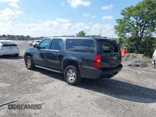2012 Chevrolet Suburban LT z VIN 1GNSKJE75CR112461, wystawiony jako IAAI lot #43325585 z przebiegiem 157 216 mil mil oraz . Historia ofert i sprzedaży dostępna na DreamBid. Obrazek 3.
