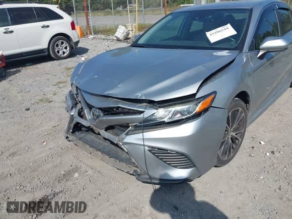 2019 Toyota Camry SE z VIN 4T1B11HK2KU785419, wystawiony jako IAAI lot #43286510 z przebiegiem 165 070 mil mil oraz . Historia ofert i sprzedaży dostępna na DreamBid. Obrazek 6.