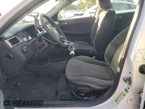 2014 Chevrolet Impala Police Police with VIN 2G1WD5E30E1155375, listed as a Copart auction lot 75031634 with 64,210 mi miles and Salvage title. Bid and sale history available at DreamBid. Image 7.