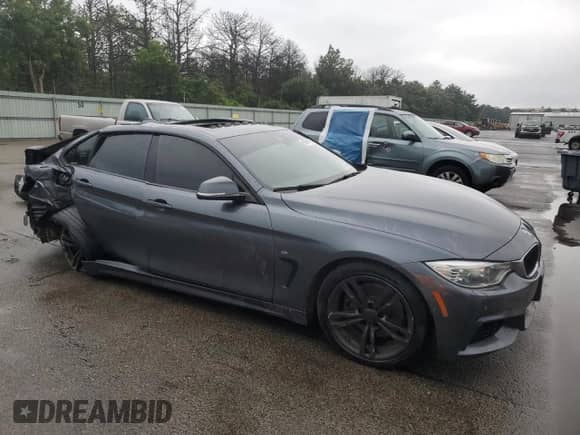 2015 BMW 4 Series 428i xDrive z VIN WBA4A7C57FD413370, wystawiony jako Copart lot #66660795 z przebiegiem Nie podano mil oraz Nie do naprawy • Non repairable. Historia ofert i sprzedaży dostępna na DreamBid. Obrazek 4.