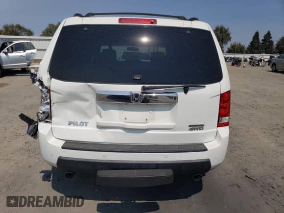 2010 Honda Pilot Touring with VIN 5FNYF4H86AB001871, listed as a Copart auction lot 70506155 with 133,582 mi miles and Salvage title. Bid and sale history available at DreamBid. Image 6.