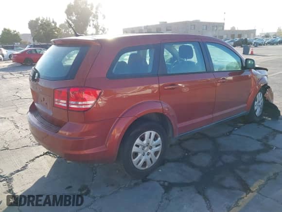 2014 Dodge Journey American Value with VIN 3C4PDCAB5ET132783, listed as a IAAI auction lot 42952190 with 108,309 mi miles and . Bid and sale history available at DreamBid. Image 4.