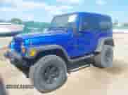 2000 Jeep Wrangler Sport with VIN 1J4FA49S0YP735660, listed as a IAAI auction lot 43192698 with Not provided miles and . Bid and sale history available at DreamBid. Image 2.