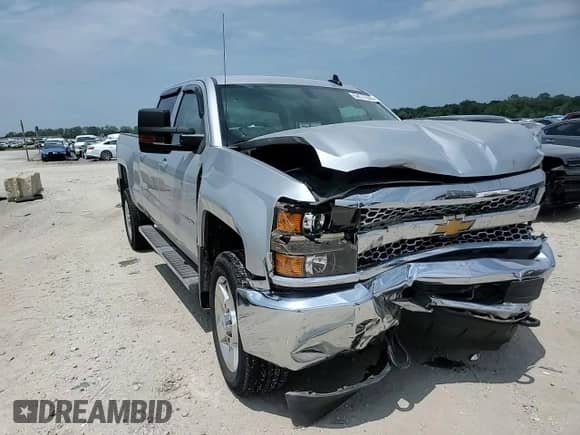 2019 Chevrolet Silverado 2500HD Work Truck z VIN 1GC1KREG9KF155249, wystawiony jako Copart lot #64574945 z przebiegiem 125 038 mil mil oraz Szkoda całkowita • Salvage title. Historia ofert i sprzedaży dostępna na DreamBid. Obrazek 13.