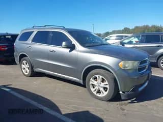 2011 Dodge Durango Crew with VIN 1D4RD4GG3BC725019, listed as a IAAI auction lot 43422140 with 186,047 mi miles and . Bid and sale history available at DreamBid. Image 1.