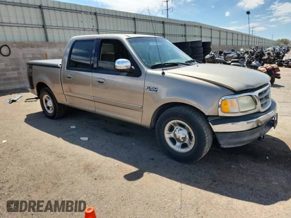 2002 Ford F-150 XLT с VIN 1FTRW07L42KC25065, выставлен на аукционе Copart как лот 70672075 с пробегом 249 564 миль миль и Списание • Salvage title. История ставок и продаж доступна на DreamBid. Изображение 4.
