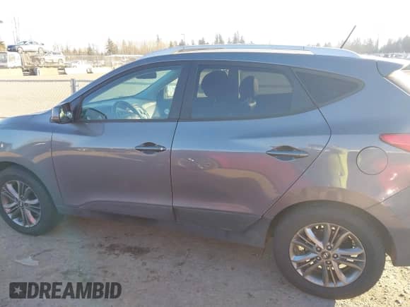 2014 Hyundai Tucson Walking Dead Edition z VIN KM8JUCAG1EU808097, wystawiony jako IAAI lot #41436214 z przebiegiem 114 198 mil mil oraz . Historia ofert i sprzedaży dostępna na DreamBid. Obrazek 14.
