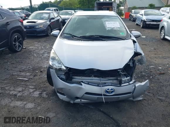 2014 Toyota Prius One with VIN JTDKDTB30E1075790, listed as a IAAI auction lot 42592812 with 100,821 mi miles and . Bid and sale history available at DreamBid. Image 13.