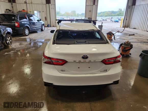 2019 Toyota Camry Hybrid LE с VIN 4T1B31HK3KU006491, выставлен на аукционе Copart как лот 81571085 с пробегом 83 074 миль миль и Списание • Salvage title. История ставок и продаж доступна на DreamBid. Изображение 6.
