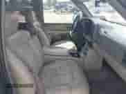 2002 Chevrolet Tahoe LT с VIN 1GNEK13Z52J317261, выставлен на аукционе IAAI как лот 42898561 с пробегом 160 824 миль миль и . История ставок и продаж доступна на DreamBid. Изображение 5.