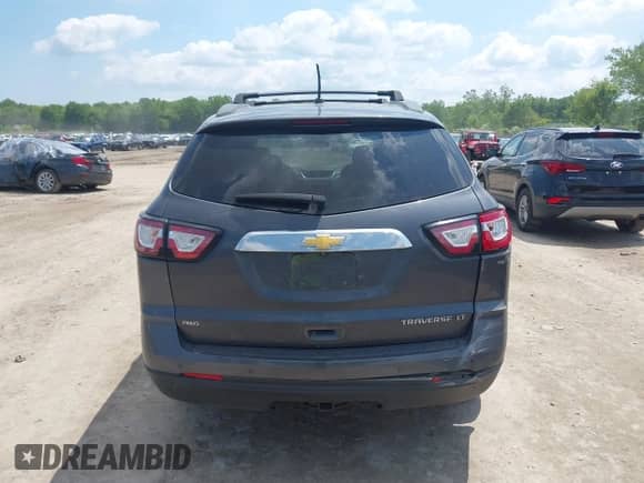2014 Chevrolet Traverse LT with VIN 1GNKVHKD7EJ283918, listed as a IAAI auction lot 42474004 with Not provided miles and . Bid and sale history available at DreamBid. Image 17.