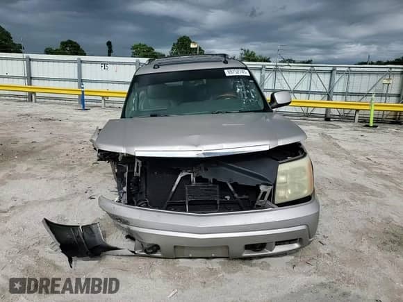 2004 Cadillac Escalade z VIN 1GYEK63N74R148393, wystawiony jako Copart lot #69752745 z przebiegiem 222 907 mil mil oraz Szkoda całkowita • Salvage title. Historia ofert i sprzedaży dostępna na DreamBid. Obrazek 15.