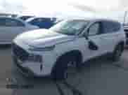 2022 Hyundai Santa Fe SE z VIN 5NMS14AJXNH414446, wystawiony jako IAAI lot #42683954 z przebiegiem 69 895 mil mil oraz . Historia ofert i sprzedaży dostępna na DreamBid. Obrazek 2.