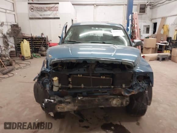 2005 Dodge Dakota SLT with VIN 1D7HW48KX5S306252, listed as a IAAI auction lot 41399238 with 140,474 mi miles and . Bid and sale history available at DreamBid. Image 12.