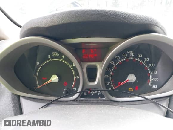 2011 Ford Fiesta SE z VIN 3FADP4BJ0BM121742, wystawiony jako IAAI lot #43162744 z przebiegiem 222 148 mil mil oraz . Historia ofert i sprzedaży dostępna na DreamBid. Obrazek 7.