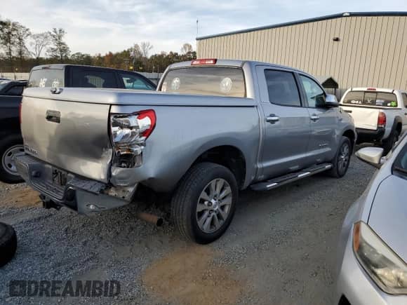 2010 Toyota Tundra Limited with VIN 5TFFY5F16AX081059, listed as a Copart auction lot 79244804 with 265,422 mi miles and Salvage title. Bid and sale history available at DreamBid. Image 3.