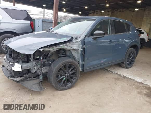 2022 Mazda CX-5 S Preferred z VIN JM3KFBCMXN0548510, wystawiony jako IAAI lot #42006919 z przebiegiem 36 893 mil mil oraz . Historia ofert i sprzedaży dostępna na DreamBid. Obrazek 2.