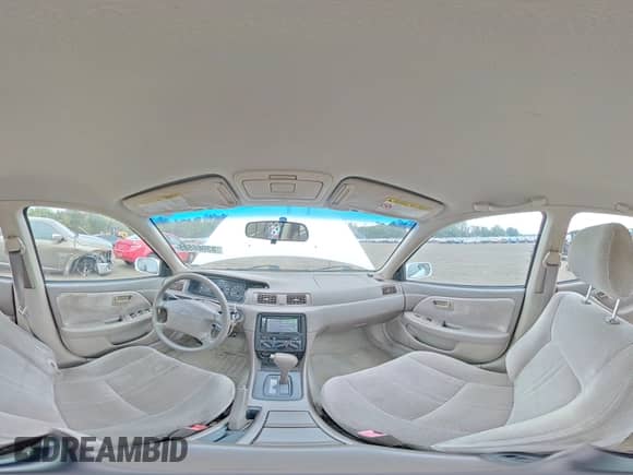 1999 Toyota Camry LE z VIN JT2BG22KXX0272539, wystawiony jako Copart lot #83966585 z przebiegiem 189 447 mil mil oraz Szkoda całkowita • Salvage title. Historia ofert i sprzedaży dostępna na DreamBid. Obrazek 14.