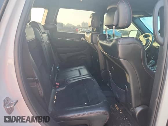 2018 Jeep Grand Cherokee Trailhawk z VIN 1C4RJFLTXJC256675, wystawiony jako Copart lot #80263015 z przebiegiem 130 103 mil mil oraz Szkoda całkowita • Salvage title. Historia ofert i sprzedaży dostępna na DreamBid. Obrazek 11.