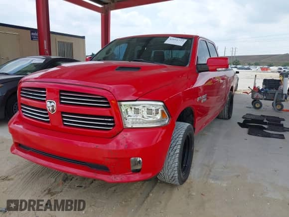 2014 Ram 1500 Sport with VIN 1C6RR6HT8ES154232, listed as a IAAI auction lot 42051723 with 122,982 mi miles and . Bid and sale history available at DreamBid. Image 2.