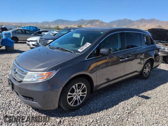2013 Honda Odyssey EX-L with VIN 5FNRL5H61DB027011, listed as a Copart auction lot 69470375 with 123,161 mi miles and Salvage title. Bid and sale history available at DreamBid. Image 1.