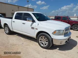 2014 Ram 1500 Longhorn z VIN 1C6RR6PTXES122156, wystawiony jako IAAI lot #42703793 z przebiegiem 160 796 mil mil oraz . Historia ofert i sprzedaży dostępna na DreamBid. Obrazek 1.