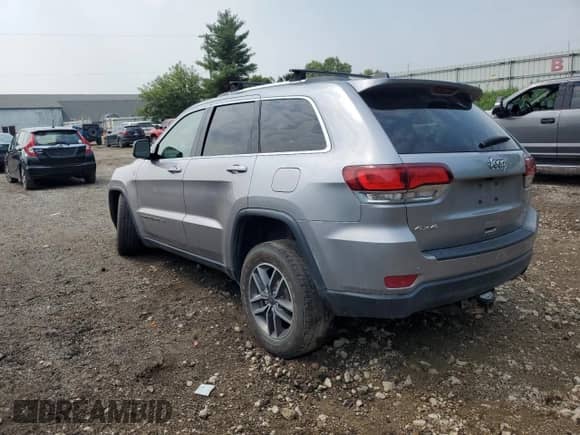 2020 Jeep Grand Cherokee Altitude with VIN 1C4RJFAG1LC256556, listed as a Copart auction lot 66965865 with 79,921 mi miles and Salvage title. Bid and sale history available at DreamBid. Image 2.
