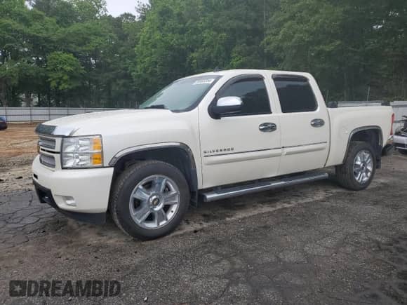 2012 Chevrolet Silverado 1500 LTZ with VIN 3GCPCTE04CG168708, listed as a Copart auction lot 54405354 with 156,487 mi miles and Salvage title. Bid and sale history available at DreamBid. Image 1.