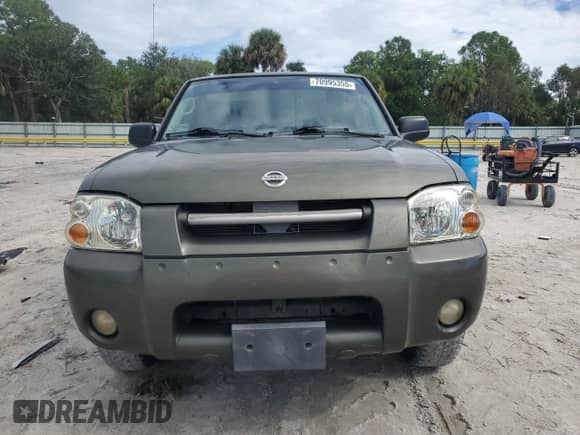 2003 Nissan Frontier XE z VIN 1N6ED26T23C452359, wystawiony jako Copart lot #70995355 z przebiegiem 168 490 mil mil oraz Szkoda całkowita • Salvage title. Historia ofert i sprzedaży dostępna na DreamBid. Obrazek 5.