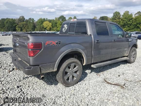 2013 Ford F-150 Lariat with VIN 1FTFW1ET6DFA23450, listed as a Copart auction lot 71629705 with 213,830 mi miles and Salvage title. Bid and sale history available at DreamBid. Image 3.