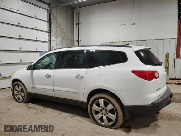 2009 Chevrolet Traverse LTZ with VIN 1GNEV33DX9S109405, listed as a Copart auction lot 84561344 with 171,791 mi miles and Salvage title. Bid and sale history available at DreamBid. Image 2.