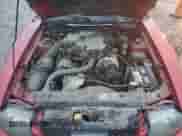 2004 Ford Mustang Deluxe z VIN 1FAFP44404F102515, wystawiony jako Copart lot #82361014 z przebiegiem 65 383 mil mil oraz Szkoda całkowita • Salvage title. Historia ofert i sprzedaży dostępna na DreamBid. Obrazek 11.