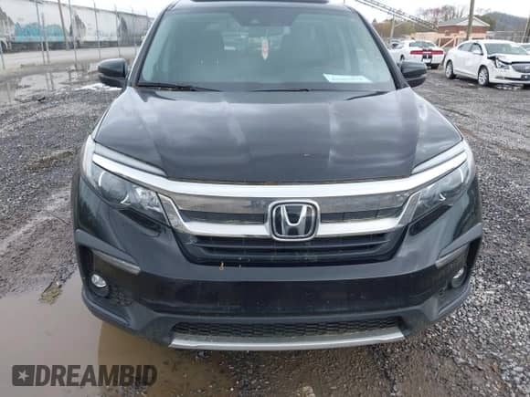 2022 Honda Pilot EX-L with VIN 5FNYF5H55NB038699, listed as a IAAI auction lot 41967073 with 58,097 mi miles and . Bid and sale history available at DreamBid. Image 12.
