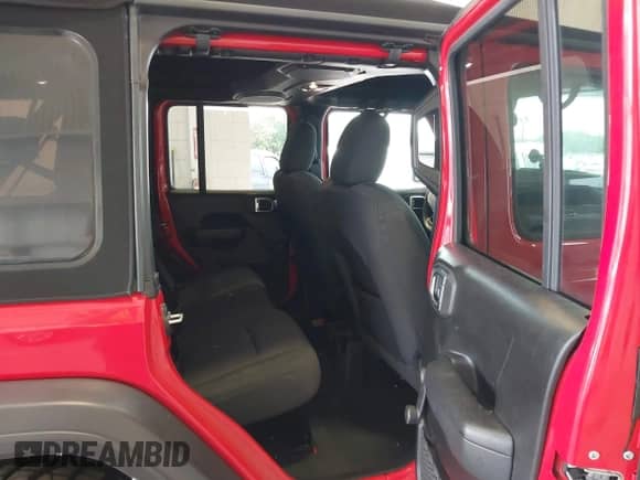 2022 Jeep Wrangler Unlimited Sport S with VIN 1C4HJXDG6NW175129, listed as a IAAI auction lot 42729541 with 50,127 mi miles and . Bid and sale history available at DreamBid. Image 8.