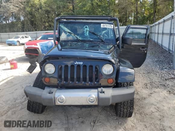 2012 Jeep Wrangler Sahara with VIN 1C4AJWBG0CL249027, listed as a Copart auction lot 84701175 with 91,717 mi miles and Salvage title. Bid and sale history available at DreamBid. Image 5.
