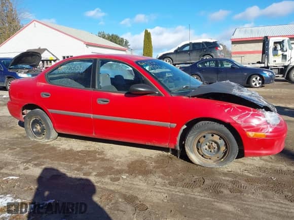 1996 Dodge Neon with VIN 1B3ES27C9TD532051, listed as a IAAI auction lot 41027554 with 116,517 mi miles and . Bid and sale history available at DreamBid. Image 14.