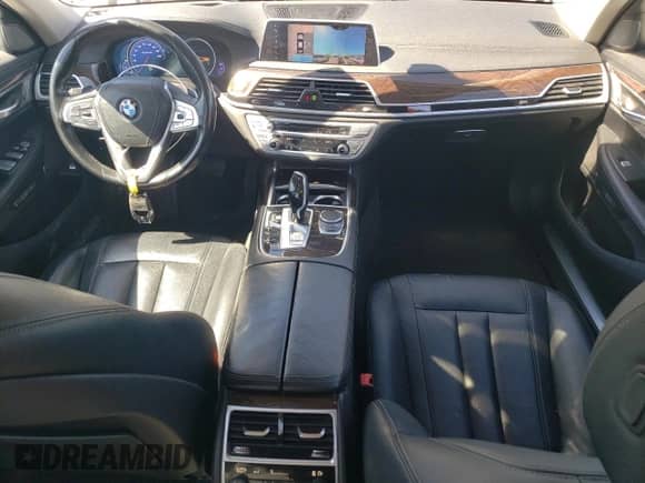 2018 BMW 7 Series 740e xDrive with VIN WBA7J2C55JG938385, listed as a Copart auction lot 49109985 with 81,567 mi miles and Salvage title. Bid and sale history available at DreamBid. Image 8.
