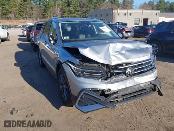 2023 Volkswagen Tiguan SE with VIN 3VVMB7AX4PM128007, listed as a IAAI auction lot 42069544 with 19,994 mi miles and . Bid and sale history available at DreamBid. Image 1.